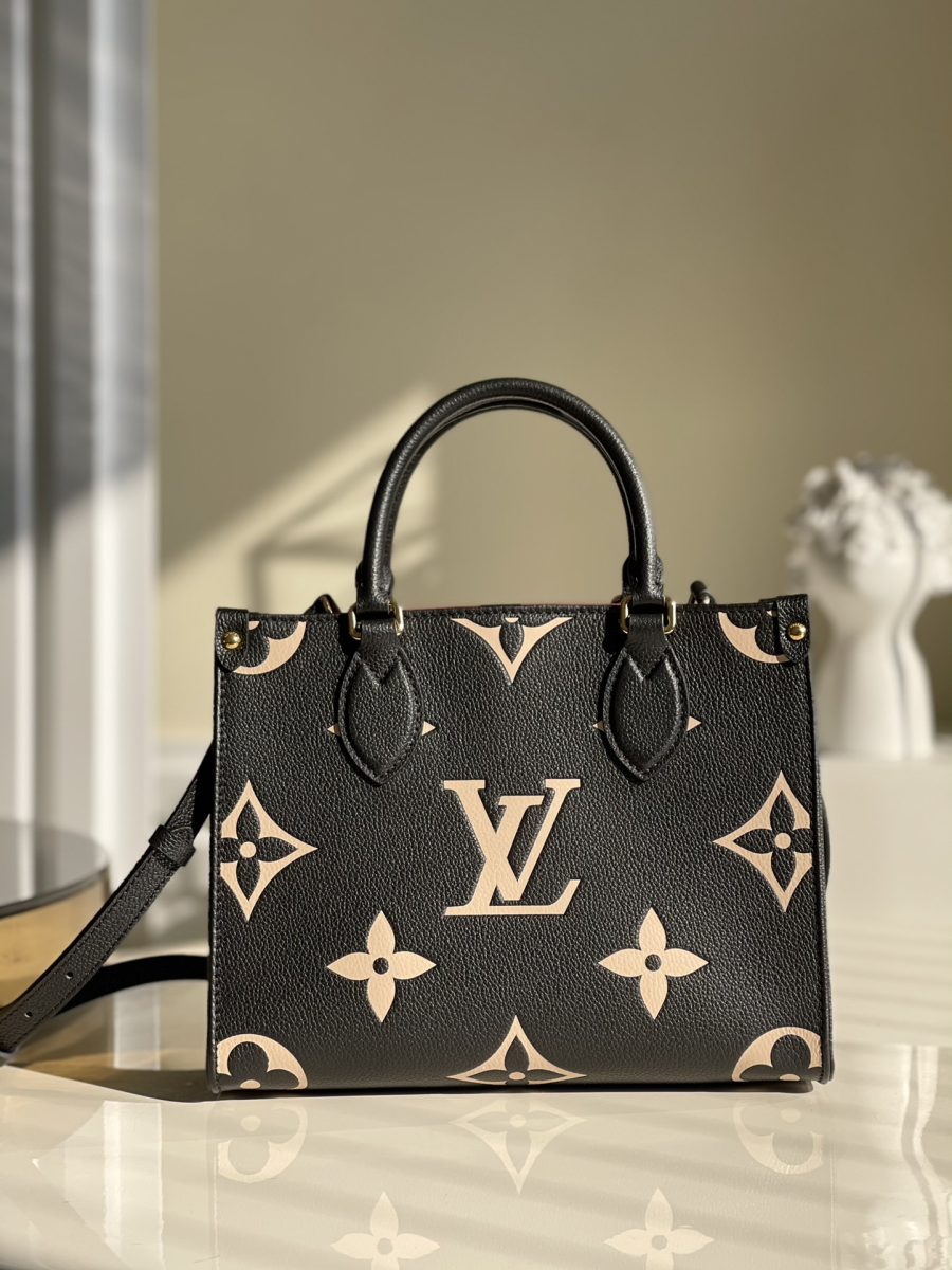 Louis Vuitton handbag in blue monogram denim canvas and natural leather