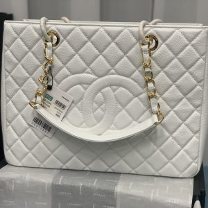 CHANEL Boy Caviar Quilted Zip Around Wallet Yellow