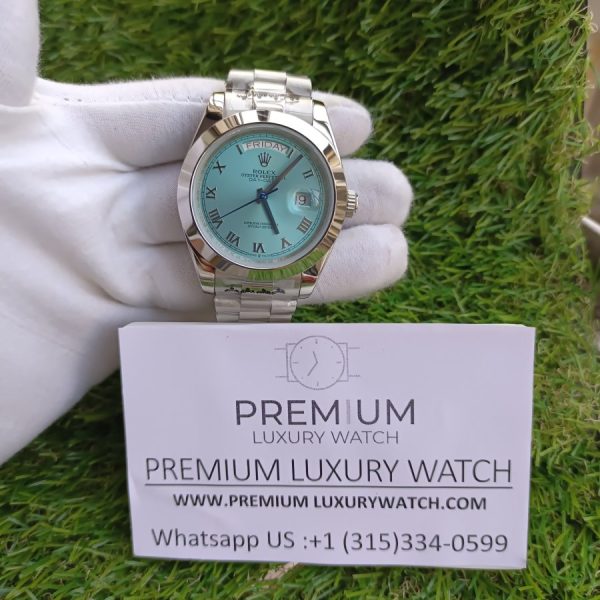 rolex platinum daydate 40 watch smooth bezel ice blue roman dial president bracelet