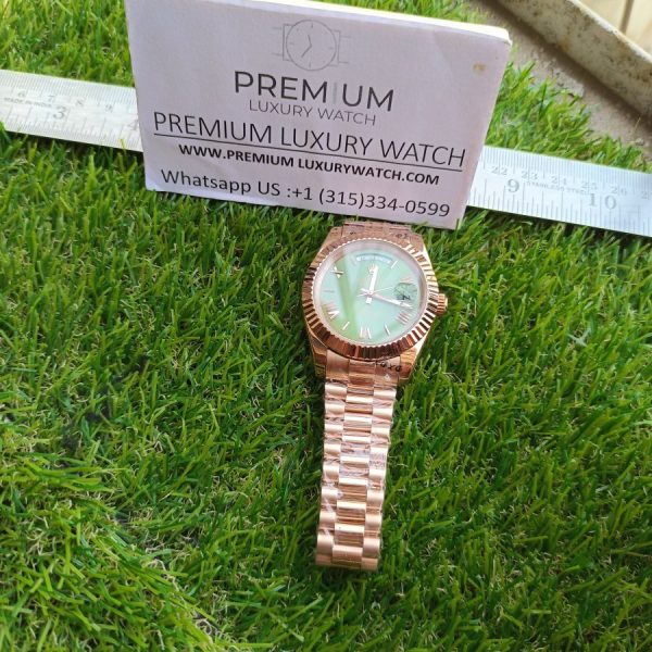 7 rolex day date 40mm president rose gold fluted bezel green roman dial mens watch