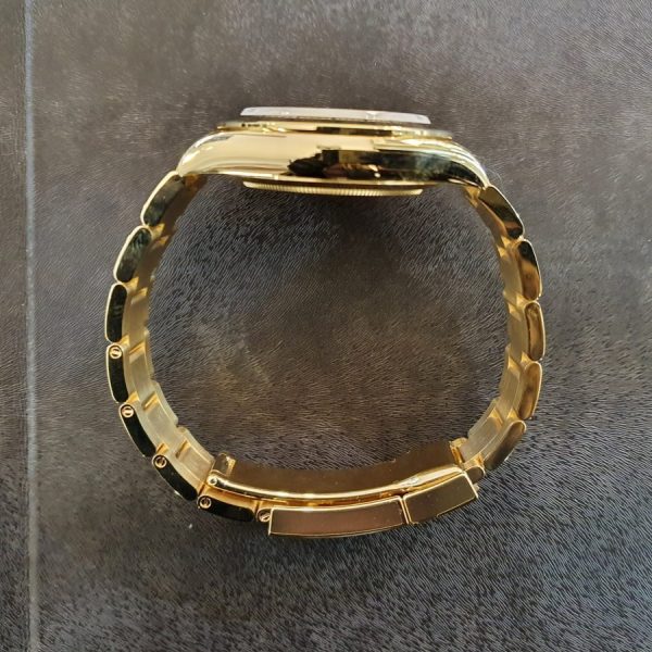 3 rolex daytona yellow gold 40mm black diamond dial yellow gold bezel oyster bracelet 116508