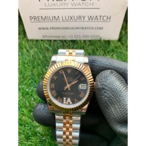 rolex lady dateGuava 31mm two tone goldblack roman dial oyster perpetual jubilee bracelet watch