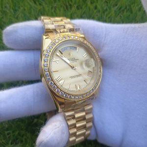 2 rolex daydate ii yellow gold champagne diamond 41mm roman dial diamond bezel president bracelet watch