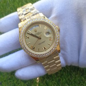 5 rolex daydate ii yellow gold champagne diamond 41mm roman dial diamond bezel president bracelet watch