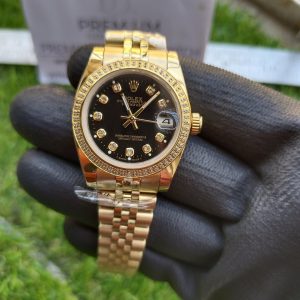 rolex lady datejust 31mm yellow gold black dial with diamond marker oyster perpetual jubilee bracelet watch