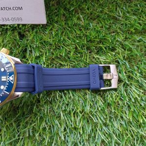 omega seamaster 300m coaxial master chronometer ceramic blue gold dial on rubber strap automatic mens watch