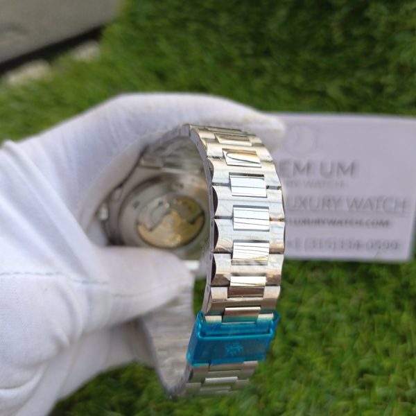 7 patek philippe nautilus black dial steel watch