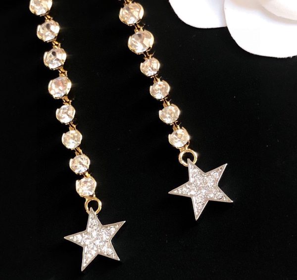 13 long star earrings gold for women 2799