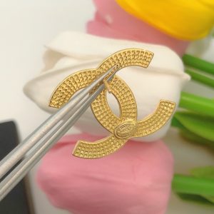 twist button earrings gold for women 2799