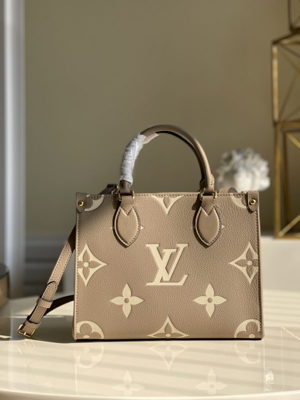 2 louis vuitton onthego pm tote bag monogram empreinte beigecream for women womens handbags shoulder and crossbody bags 98in25cm lv m45779 9988