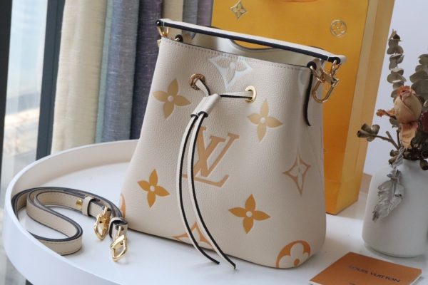 louis vuitton neonoe bb bucket bag monogram empreinte creamsaffron for women womens bags shoulder bags 79in20cm lv m45716 9988