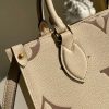 louis vuitton onthego pm monogram empreinte tourterelle greybeige for women womens handbags shoulder and crossbody bags 98in25cm lv m45654 9988