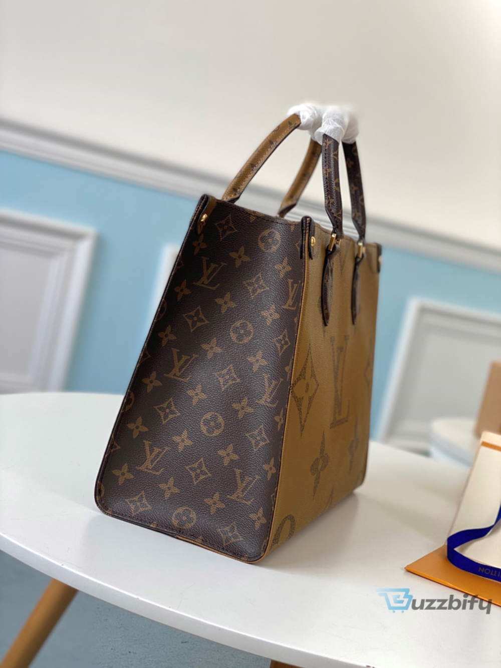 louis vuitton onthego mm monogram and monogram reverse canvas for women womens handbags shoulder bags 138in35cm lv m45321 2799 buzzbify 1 2