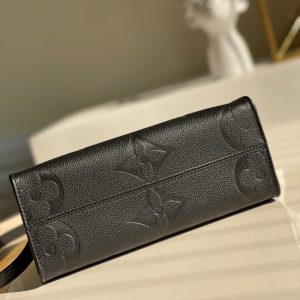 louis vuitton onthego pm tote bag monogram empreinte black for women womens handbags shoulder and crossbody bags 98in25cm lv m45653 buzzbify 1 3