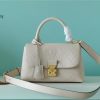 louis vuitton madeleine bb monogram empreinte creme beige for women womens handbags shoulder and crossbody bags 94in24cm lv m46008 buzzbify 1