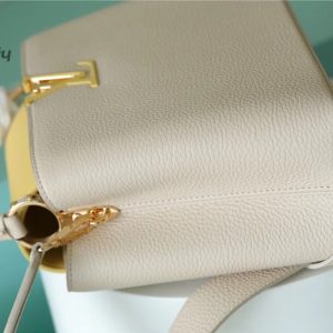 louis vuitton capucines mm taurillon creme beige plume yellow berlingot for women womens bags shoulder and crossbody bags 124in315cm lv m59883 buzzbify 1 3