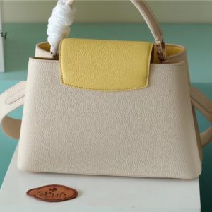 louis vuitton capucines mm taurillon creme beige plume yellow berlingot for women womens bags shoulder and crossbody bags 124in315cm lv m59883 buzzbify 1 7