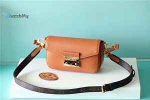 louis vuitton swing monogram hazelnut brown for women womens handbags shoulder and crossbody bags 24cm94in lv m20396 buzzbify 1