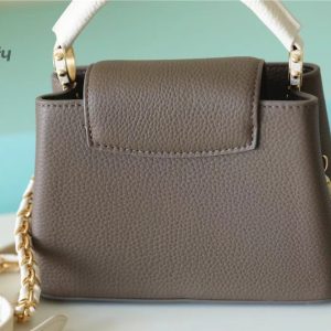 louis vuitton capucines mini taurillon smokey brown green creme pink for women womens handbags shoulder and crossbody bags 21cm83in lv buzzbify 1 4