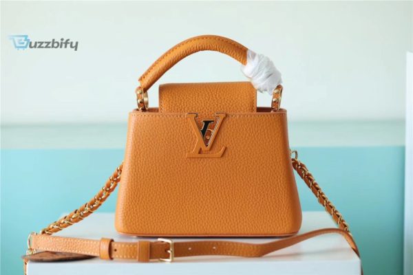 louis vuitton capucines mini taurillon jaune sunbeam for women womens handbags shoulder and crossbody bags 21cm83in lv buzzbify 1