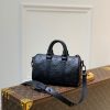 louis vuitton keepall xs monogram seal black for women womens handbags shoulder and crossbody bags 83in21cm lv m57960 buzzbify 1